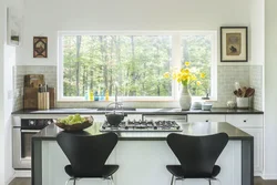 Stove by the window in the kitchen photo