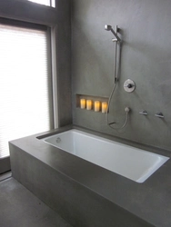 Concrete bathtub photo