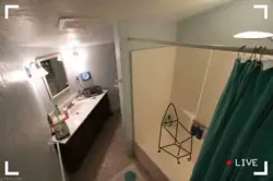 Photo Camera In The Bathroom