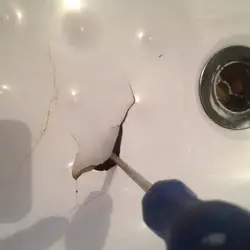 Photo Of Hole In Bathroom