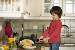 Boy in the kitchen photo