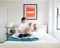 Photo Of Family In Bedroom