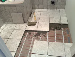 Laying porcelain tiles bathroom photo