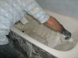 Self-filling bathtub photo