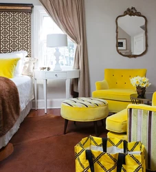 Yellow armchair in the bedroom interior