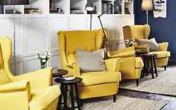 Yellow armchair in the bedroom interior