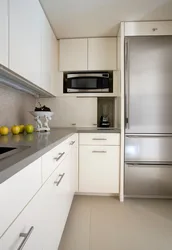 Kitchen design with wide refrigerator