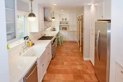 Kitchens with red floor design