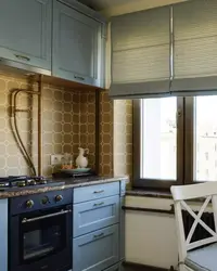 Small kitchen design with gas pipe
