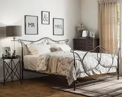 Bedroom design with white metal bed