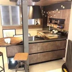 Kitchen design in a Euro-room apartment with a bar counter