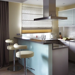 Kitchen design in a Euro-room apartment with a bar counter