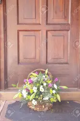 Flowers in the apartment door photo