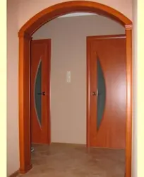Doors for arches in an apartment photo