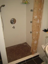 Do-it-yourself shower in an apartment made of tiles photo