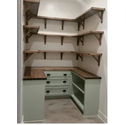 Photo of a storage room in an apartment with do-it-yourself shelves