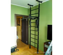 Wall bars in an apartment with wall mounting photo