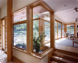 Wooden windows in the interior of the apartment