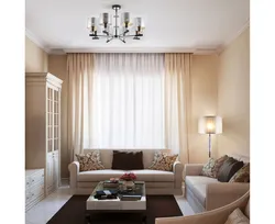 Design of a guest room in an apartment with a sofa