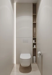 Kabinet və plitələr olan bir mənzildə tualetin dizaynı