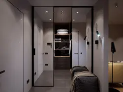 Hallway cabinet design opposite the door
