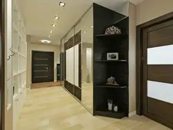 Hallway cabinet design opposite the door