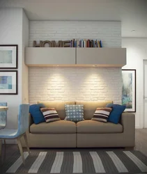 Дизайн гостиной с диваном и шкафом