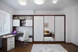 Bedroom design with wardrobe and table