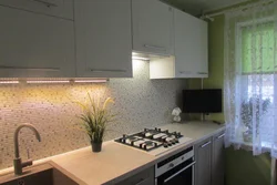 Tasteful kitchen design with backsplash