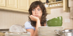 Washing Dishes In The Kitchen Photo