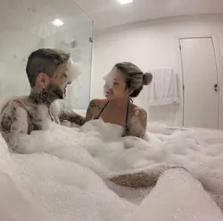 In The Bathtub With Steam Photo
