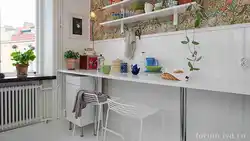 What Is The Name Of The Photo In The Kitchen