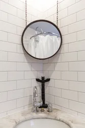 Photo Of A Bathtub With A Corner Mirror