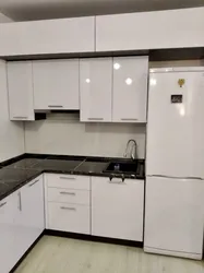 White kitchen with mezzanines photo