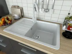 Light kitchen sink photo