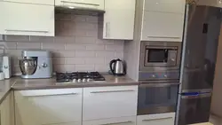 Kitchen oven with refrigerator photo