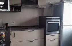 Kitchen oven with refrigerator photo