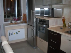 Kitchen oven with refrigerator photo