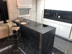 Photo of kitchen in black stone