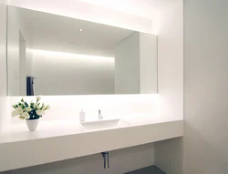 Mirror in a small bathroom photo