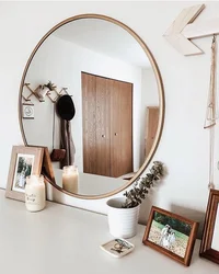 Hanging mirror in the hallway photo