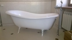 Acrylic bathtub with legs photo