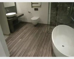 Vinyl laminate flooring in the bathroom photo