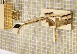 Golden bath mixer photo