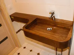 Wooden sinks and bathtubs photo