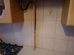 Photo of kitchen pipes in countertop