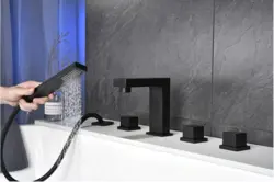 Black taps in the bathroom photo