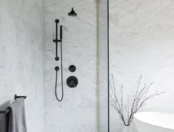 Black taps in the bathroom photo