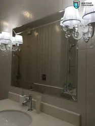 Bathtub with mirror wall photo