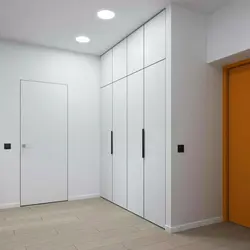 Hallway closet white doors photo